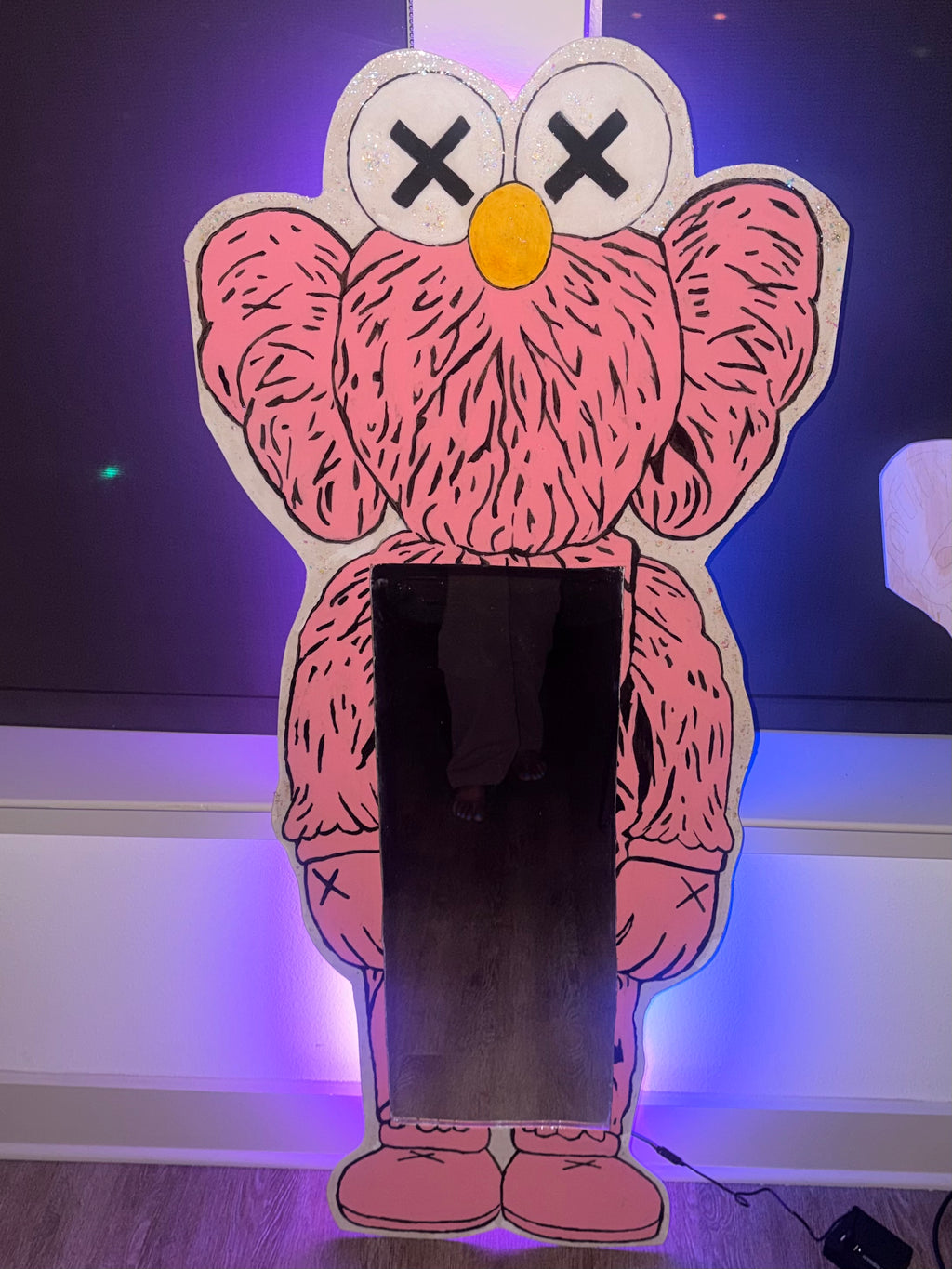 Pink Kaws mirror
