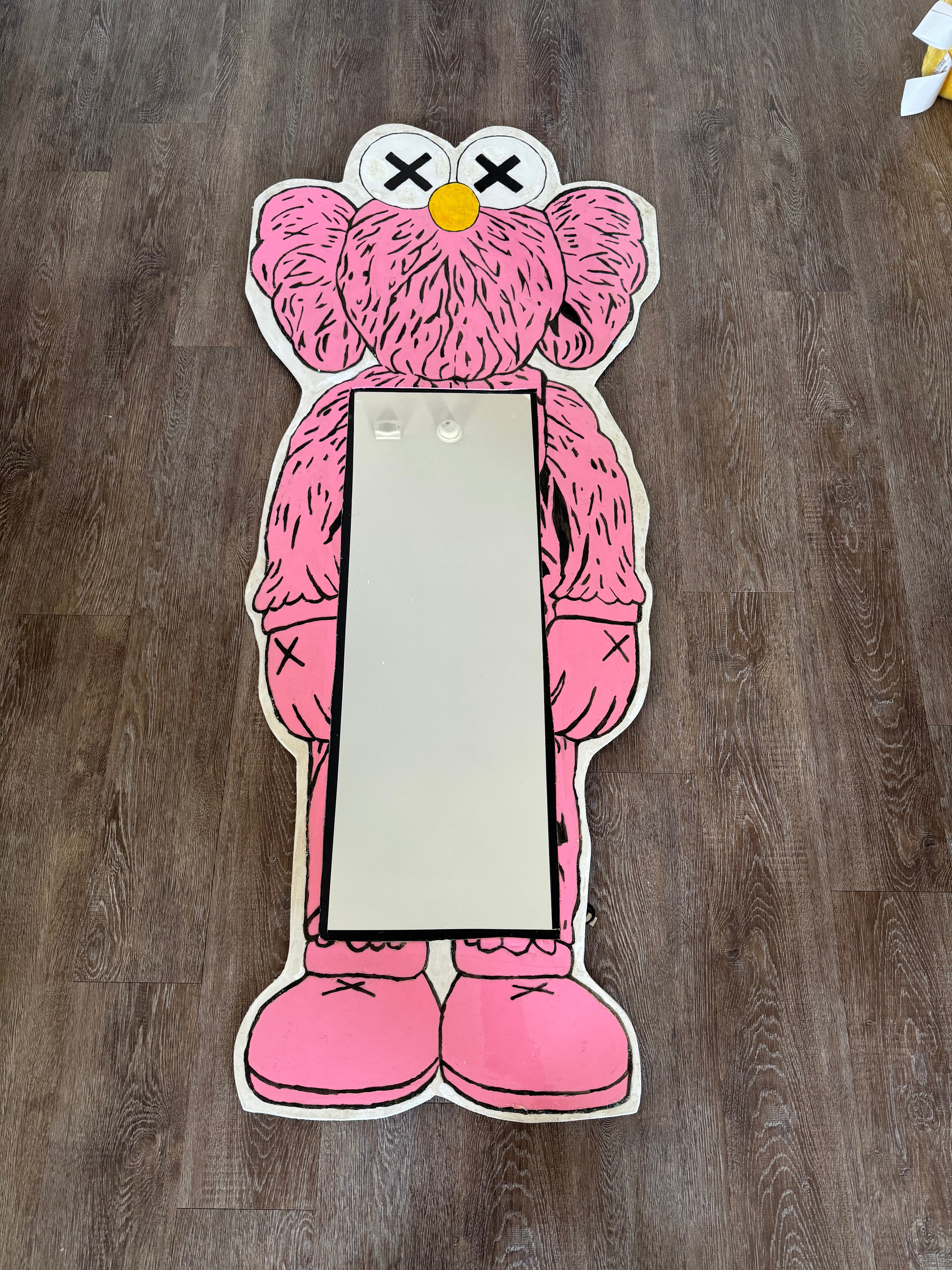Pink Kaws mirror