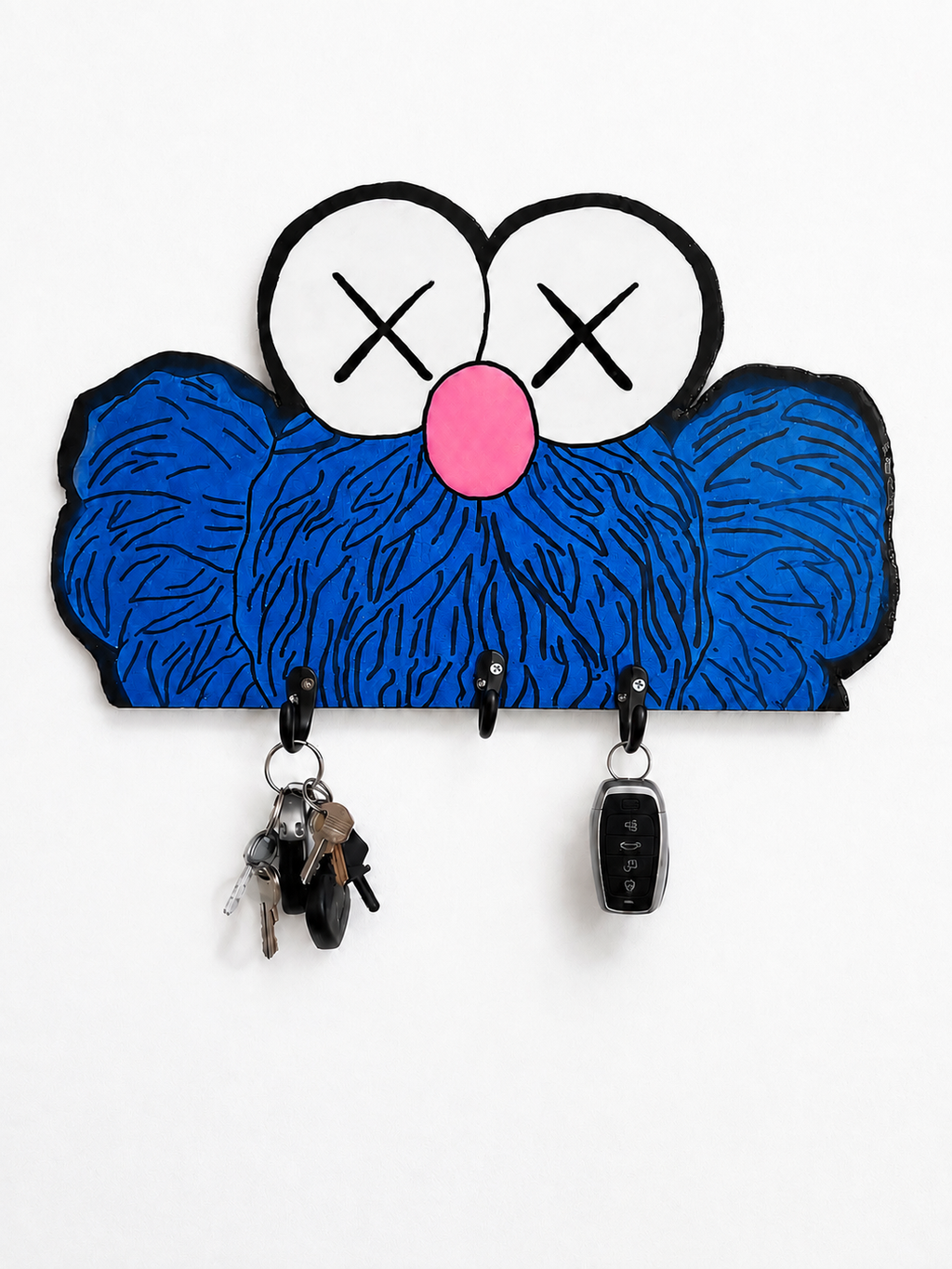 Kaws key holder